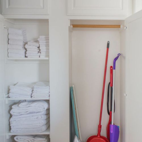 Extra linens/towels + cleaning supplies located in the hallway cabinets.