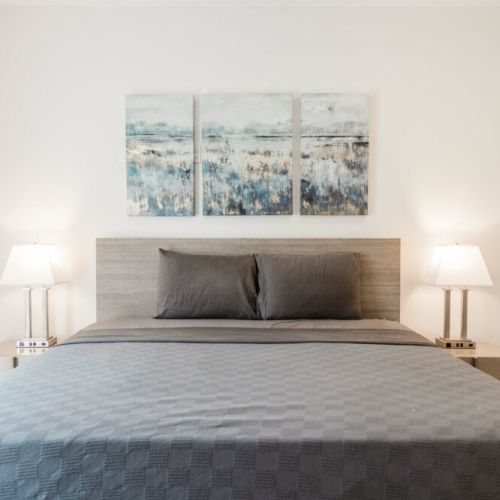 King-sized bed and ambiant lighting for the master bedroom.