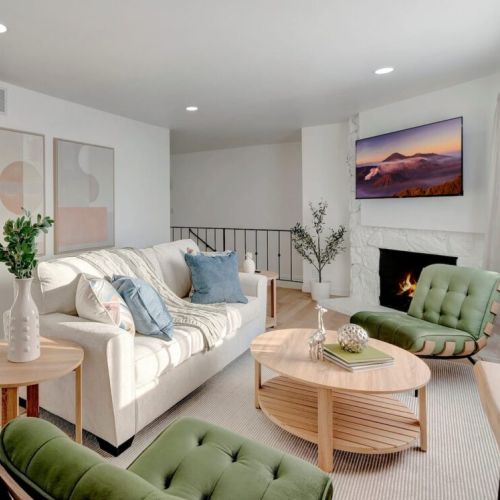 A sofa bed in the living room offers a versatile seating and sleeping solution, perfect for small spaces or accommodating guests.