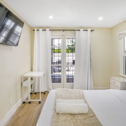 Bedroom 1 with access to backyard