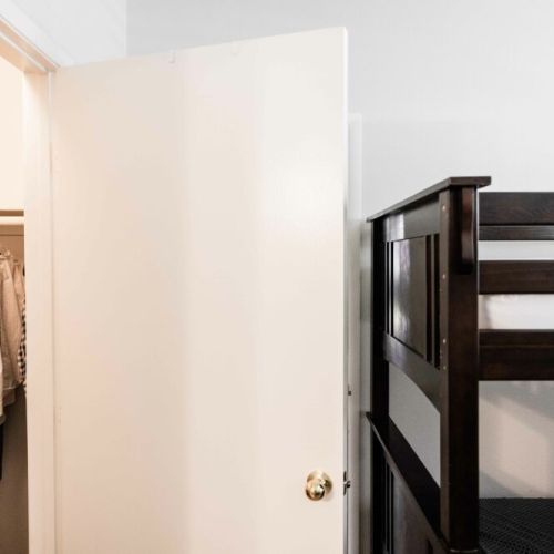 Walk-in closet in second bedroom