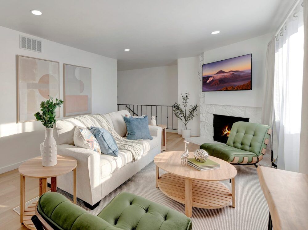 A sofa bed in the living room offers a versatile seating and sleeping solution, perfect for small spaces or accommodating guests.