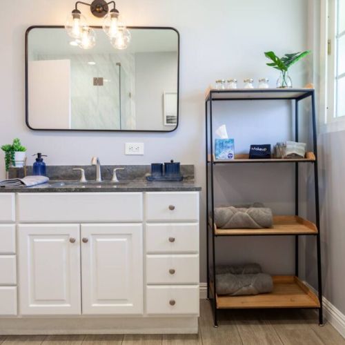 Large master bathroom with bathtub, large walk-in shower and plenty of natural light.