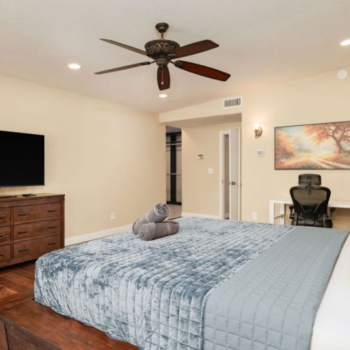 Master bedroom suite with work desk