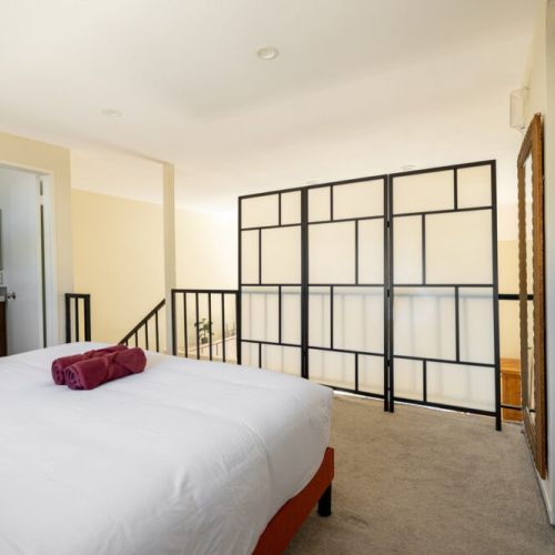 Master loft bedroom has a divider you can put up for privacy from the living room downstairs