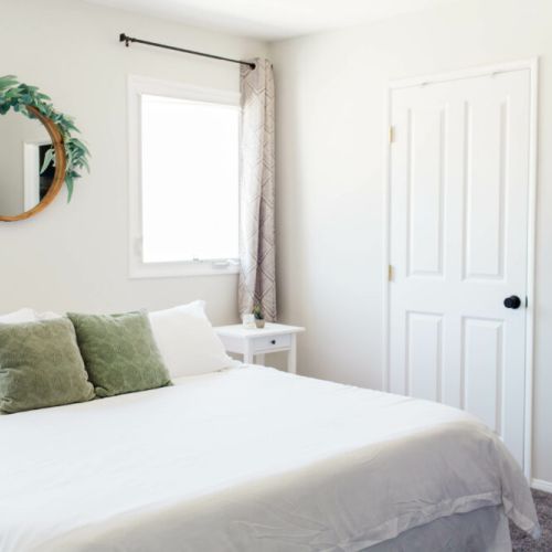 Master bedroom with door into master bathroom