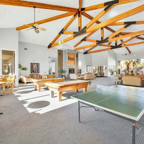 Large community center with pool tables, ping pong table, and more!