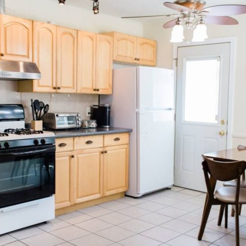Kitchen + Dining Area. Door leads to the back patio