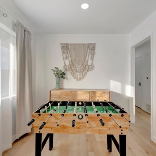 A multi-game table combines several popular games like foosball, ping pong, and pool into one compact unit, providing endless entertainment options. It’s perfect for family fun, offering a variety of activities to keep everyone entertained!
