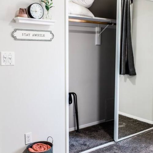Mirror closet in second bedroom.