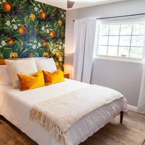 Orange Blossom Room is beautifully designed with a queen memory foam mattress, great natural light or black out curtains. This room is ready for a great night of sleep after a busy day or night of work or entertainment. Includes 40 in Roku TV.