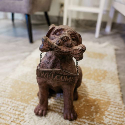 Isn't he adorable? He doesn't mind being used as a door stop either.