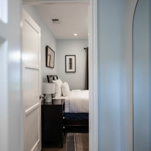 View of bedroom from bathroom
