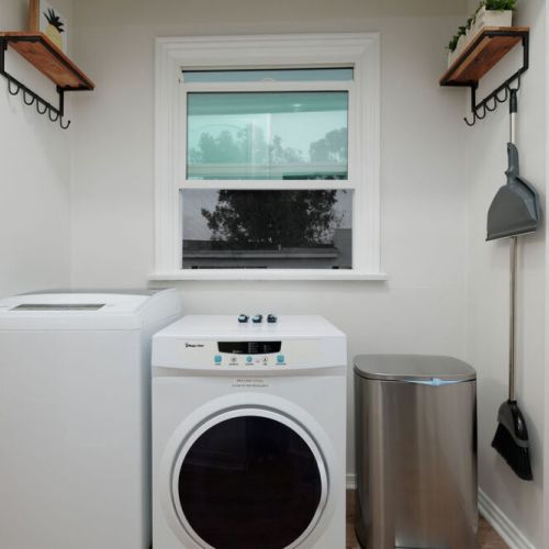 Laundry adjacent to kitchen