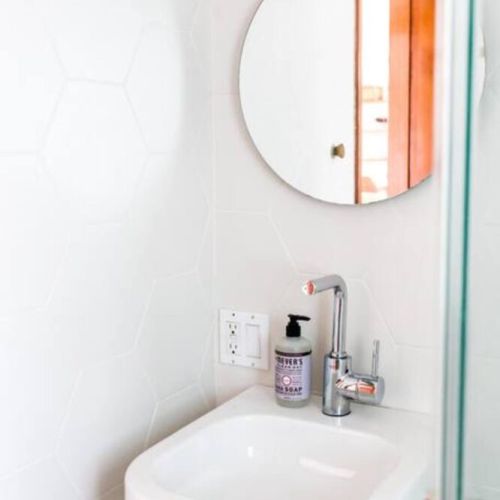 Second bathroom right outside second bedroom