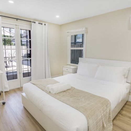 Bedroom 1 with access to backyard