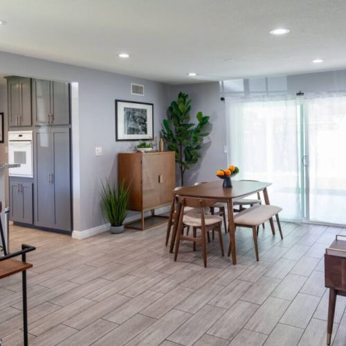 Great dining room with a table for 6 and 2 stools at the counter. A beautiful bar is available to make yourself a drink or pour a glass of wine at the end of the day. A coffee bar is strategically placed as you walk into the dining room.