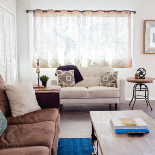 Open and roomy living room with plenty of sunlight.