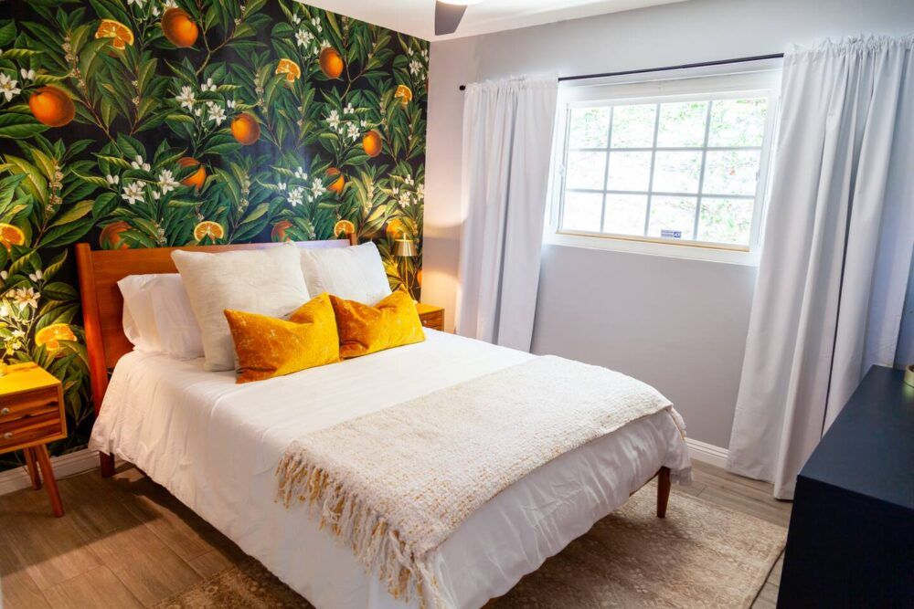 Orange Blossom Room is beautifully designed with a queen memory foam mattress, great natural light or black out curtains. This room is ready for a great night of sleep after a busy day or night of work or entertainment. Includes 40 in Roku TV.
