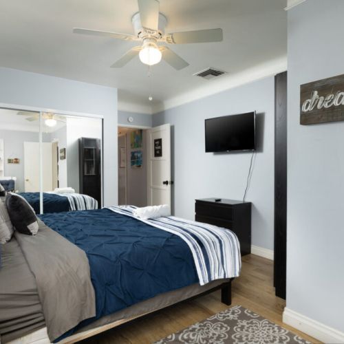 More master bedroom views - equipped with a 4K Smart TV and ceiling fan