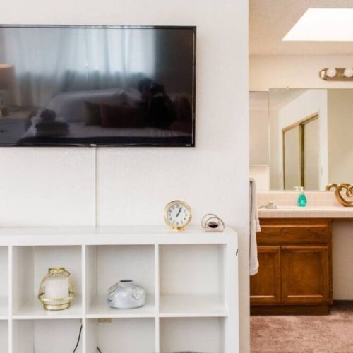 4K Smart TV + double sinks in master bathroom