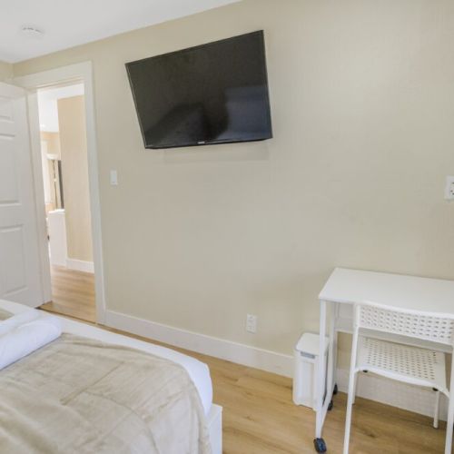 Bedroom 1 with access to backyard