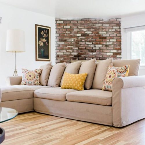 Living room sofa doubles up as a sofa bed for additional guests