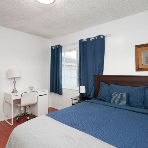 Fifth bedroom equipped with a twin-size bed and desk