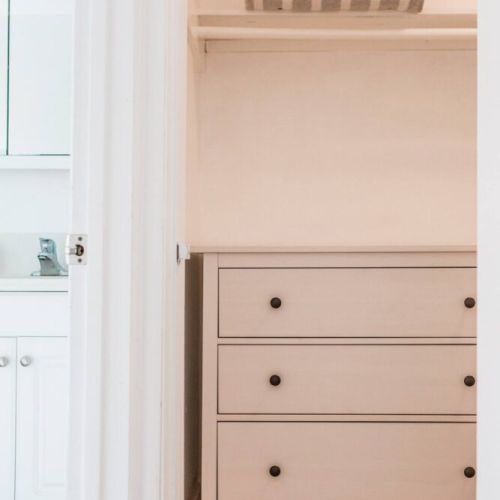 Master's walk-in closet and dresser