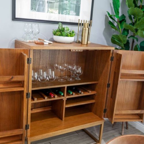 Great dining room with a table for 6 and 2 stools at the counter. A beautiful bar is available to make yourself a drink or pour a glass of wine at the end of the day. A coffee bar is strategically placed as you walk into the dining room.