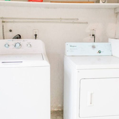 Washer and dryer. Laundry detergent provided.