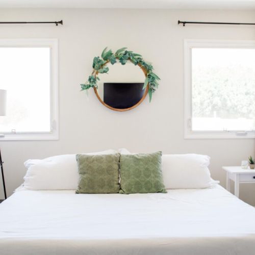 Master bedroom furnished with a king-sized bed