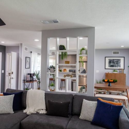 Open concept living room, dining room and kitchen. Awesome natural light comes in through the big windows and slider.