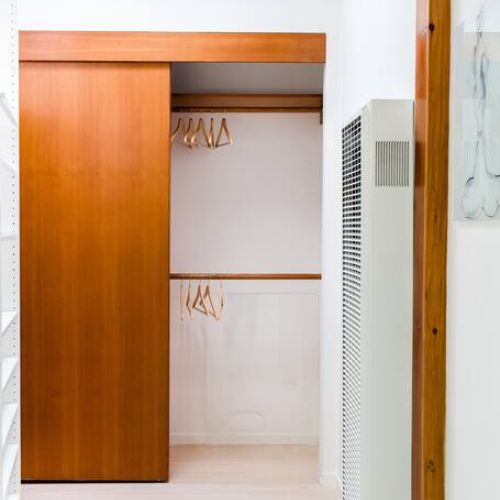 The master bedroom has its own closet and plenty of storage space.