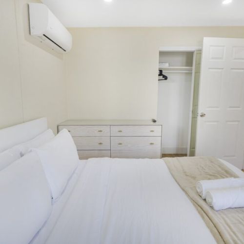 Bedroom 1 with access to backyard