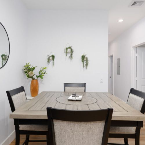 Gather around for a yummy meal right next to the kitchen.