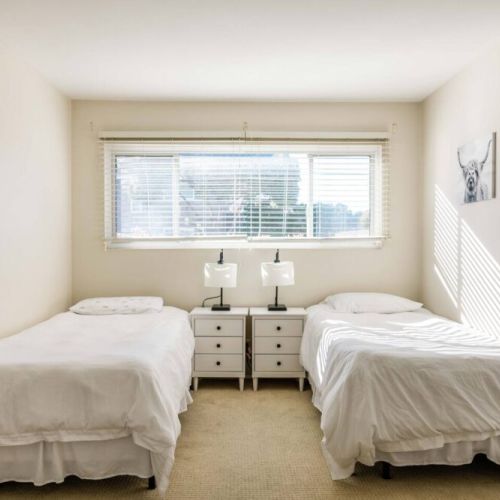 Two twin beds in second bedroom