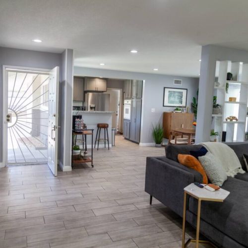 Enter into a roomy open concept living room and dining room.